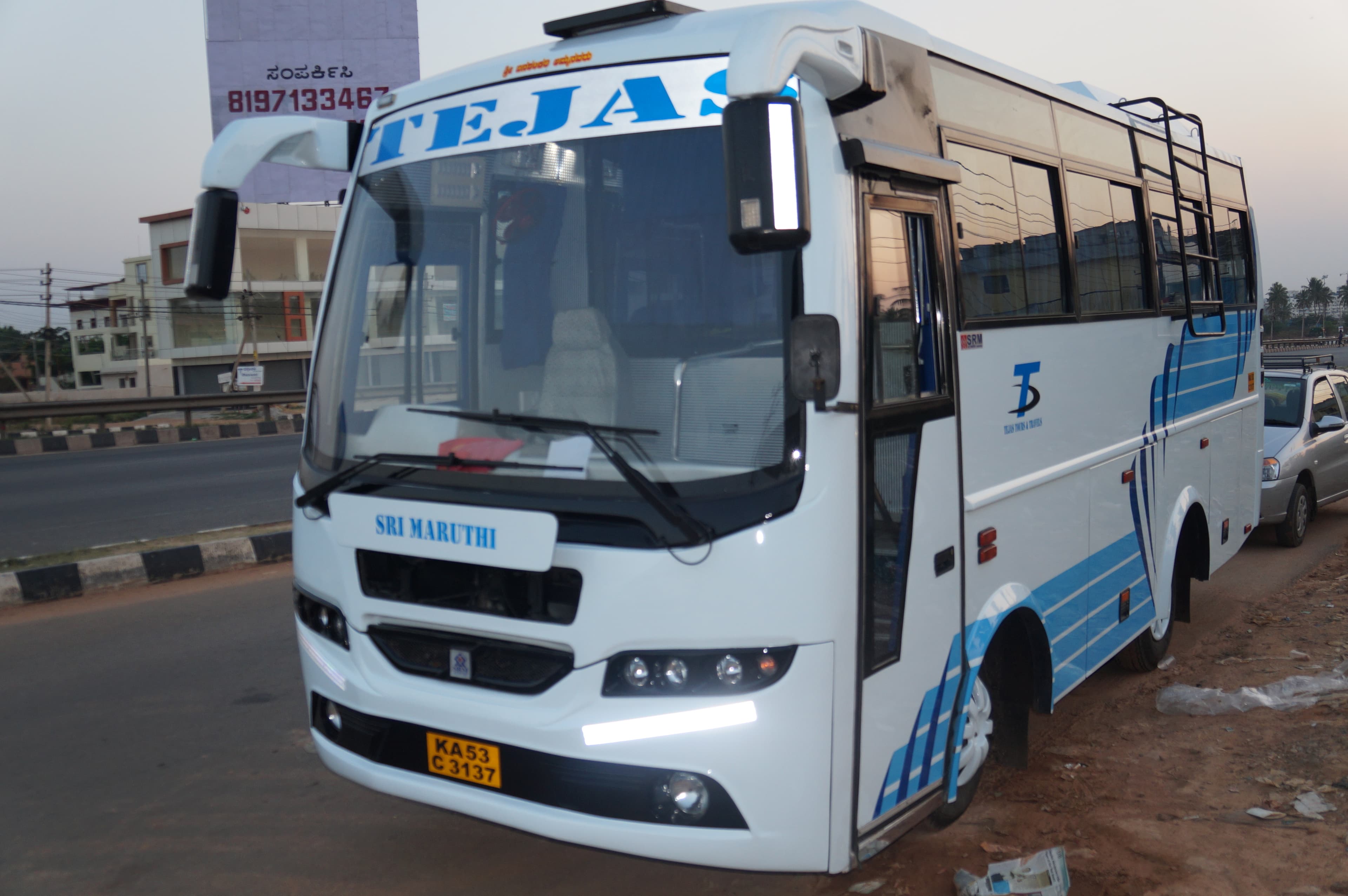 Tejas Tours and Travels Mini Bus